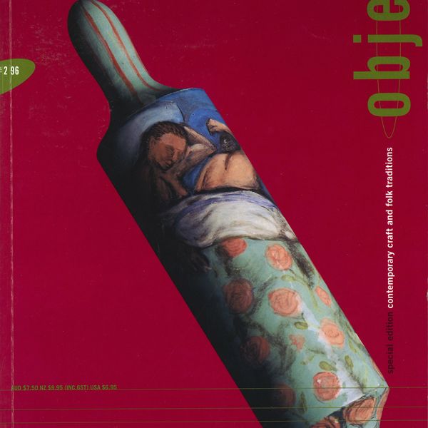 A magazine cover featuring a hand painted rolling pin in front of a red background